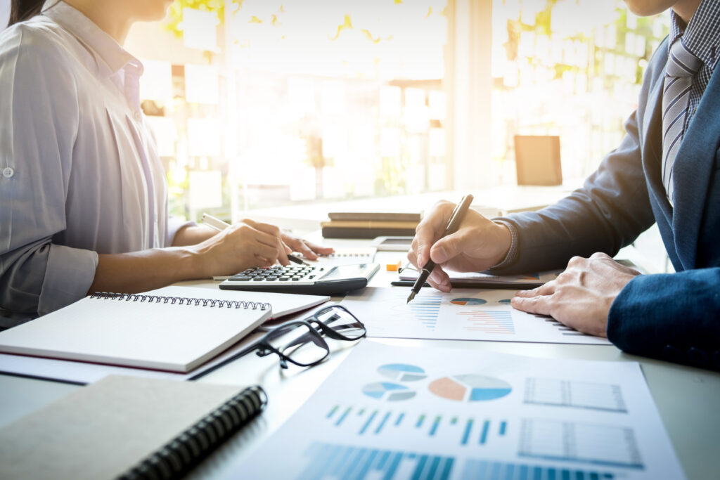 Automatic Exchange of Information Regime 5 business man financial inspector secretary making report calculating checking balance internal revenue service inspector checking document audit concept
