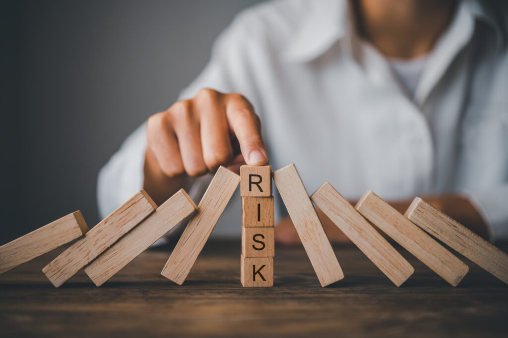 Hospitality Industry - Turning Risk Into Opportunity 9 midsection man holding wooden blocks