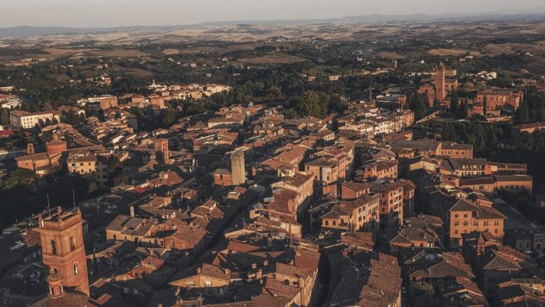 birds eye view of a sunkissed town in italy 1