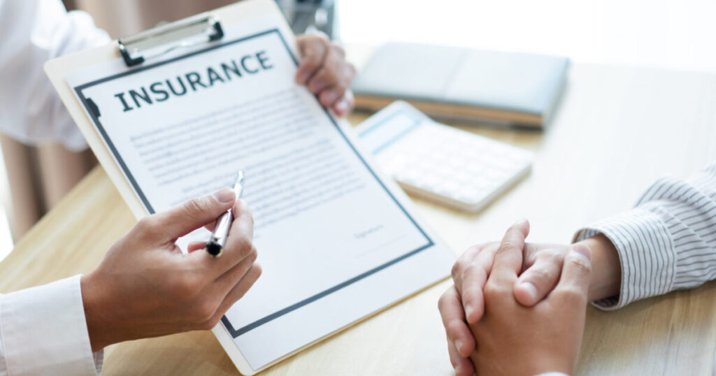 Insurance Assistance During Covid-19 Crisis 3 midsection business colleagues working office scaled e1788945628645