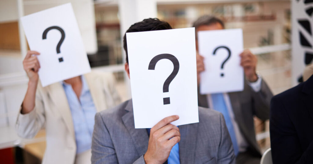 office paper business people with question mark face corporate seminar solution employees audience sign with emoji presentation query conference problem solving scaled e1788944833144