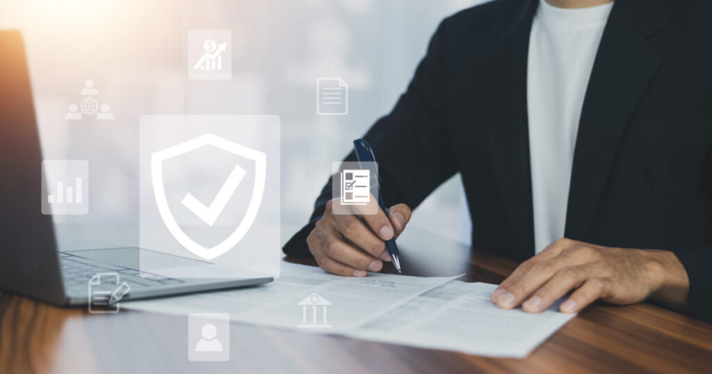 How Internal and External Assurance Assist the Performance of Company. 1 man using computer buy insurance online home scaled e1788944536988
