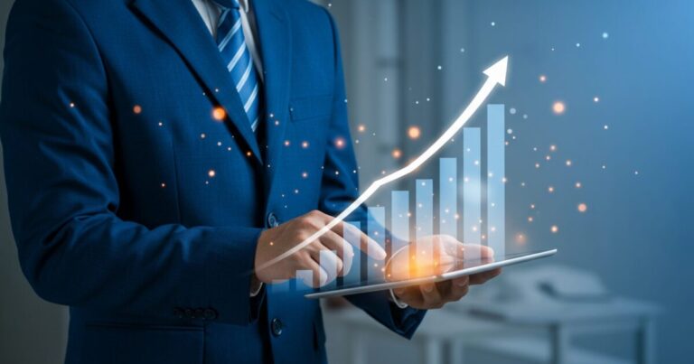How could SMEs in Malaysia muddle through the economy in 2023? 12 businessman blue suit analyzes digital growth chart tablet scaled e1788946153507
