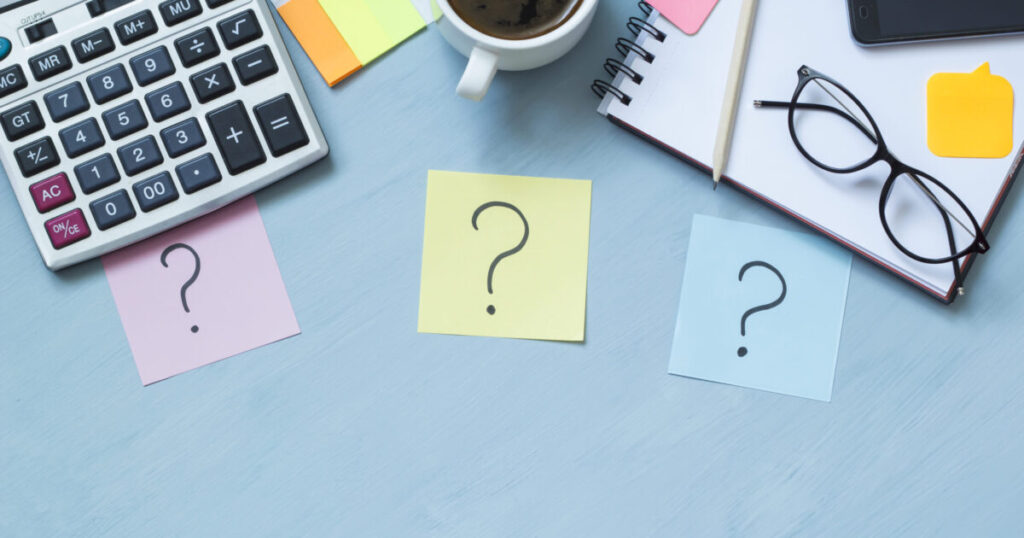 Questions on Individual Income Tax Malaysia in 2023? 1 three question marks desktop office copy space scaled e1788940358874