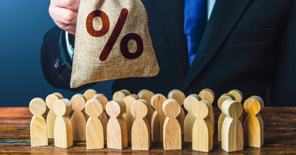 businessman offers bag with percent symbol people favorable investment offer scaled e1788943630978